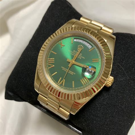 rolex day date gold grün fake